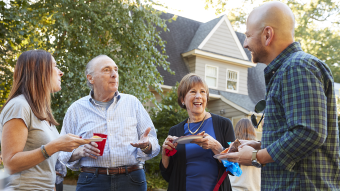 Neighbors outside eating