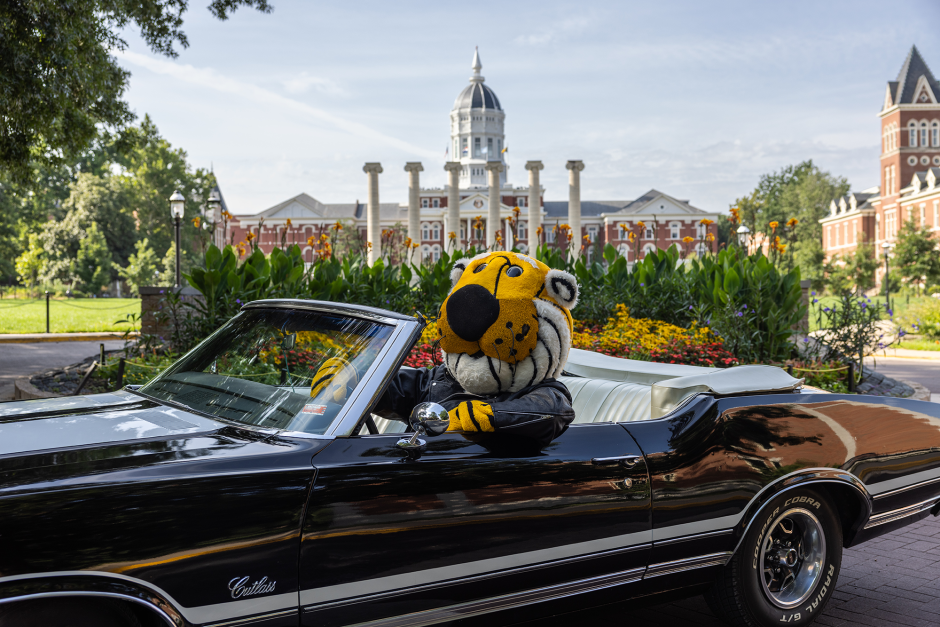 Truman in sports car