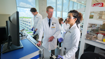 Researchers working in a lab.