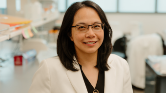 Dr. Lin posing in a lab.
