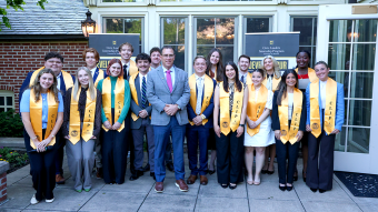 Group of interns in front of building