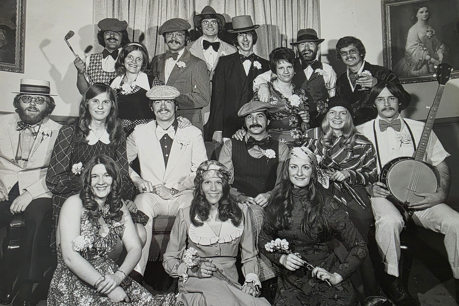 Black and white photograph from mid-1970s of RA's dressed as characters from "The Great Gatsby"