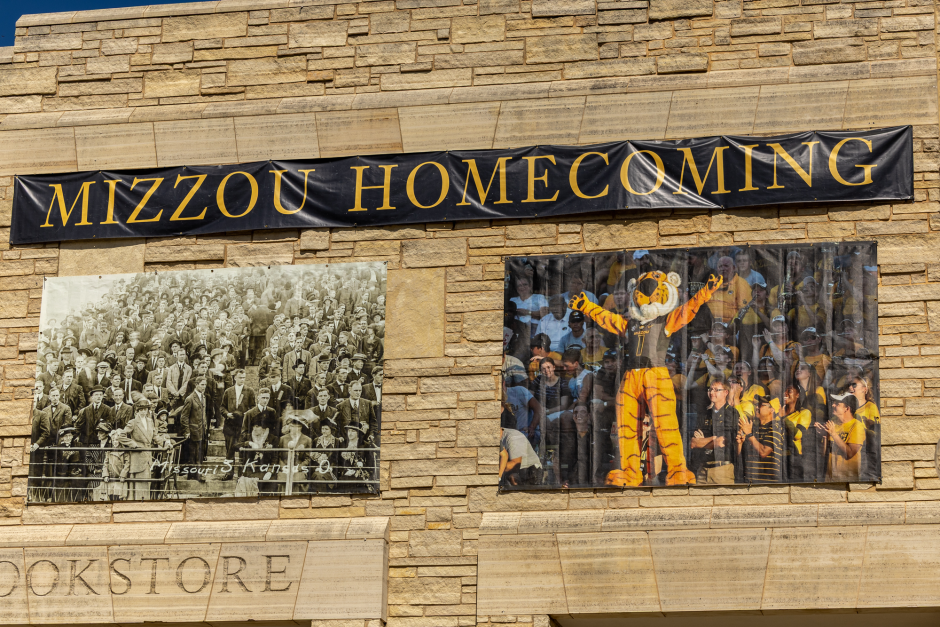 Homecoming images on side of building