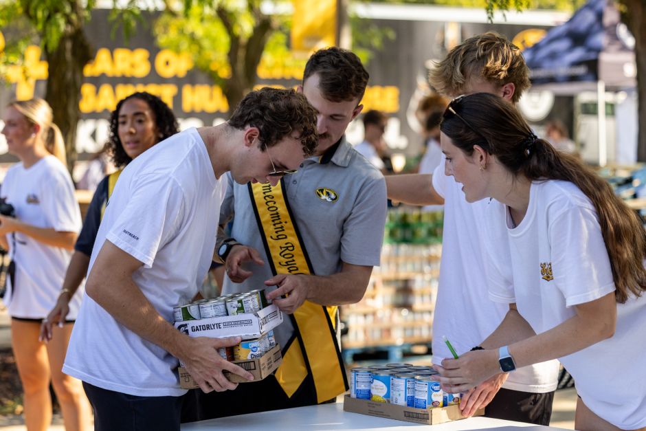 Students sort canned food