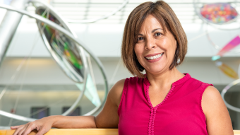 Olga Baker posing in the Bond Life Sciences Center.