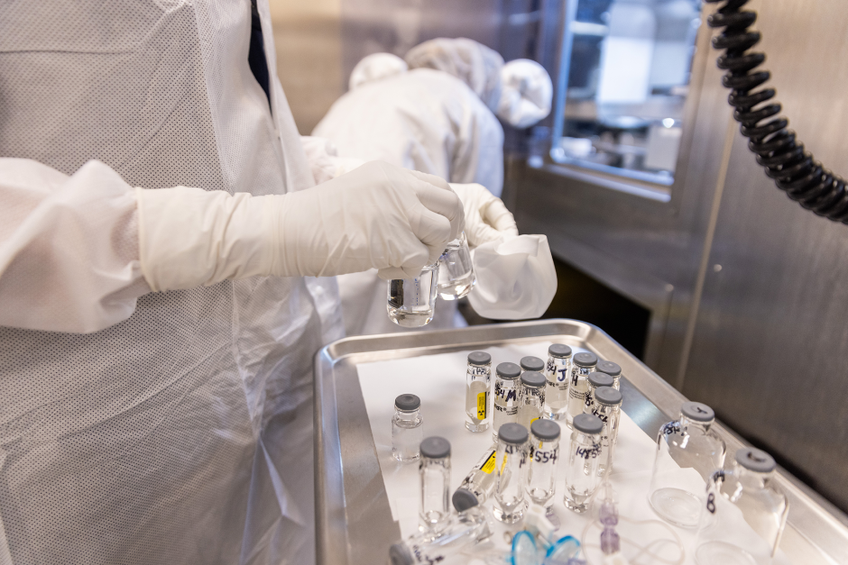 Hand sort bottles of isotopes 