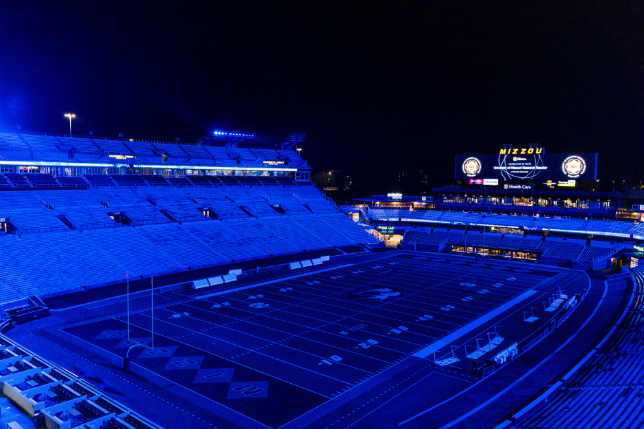 Memorial Stadium lit blue