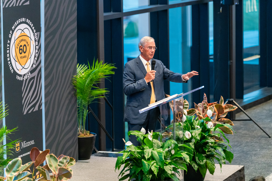 Man in suit at podium