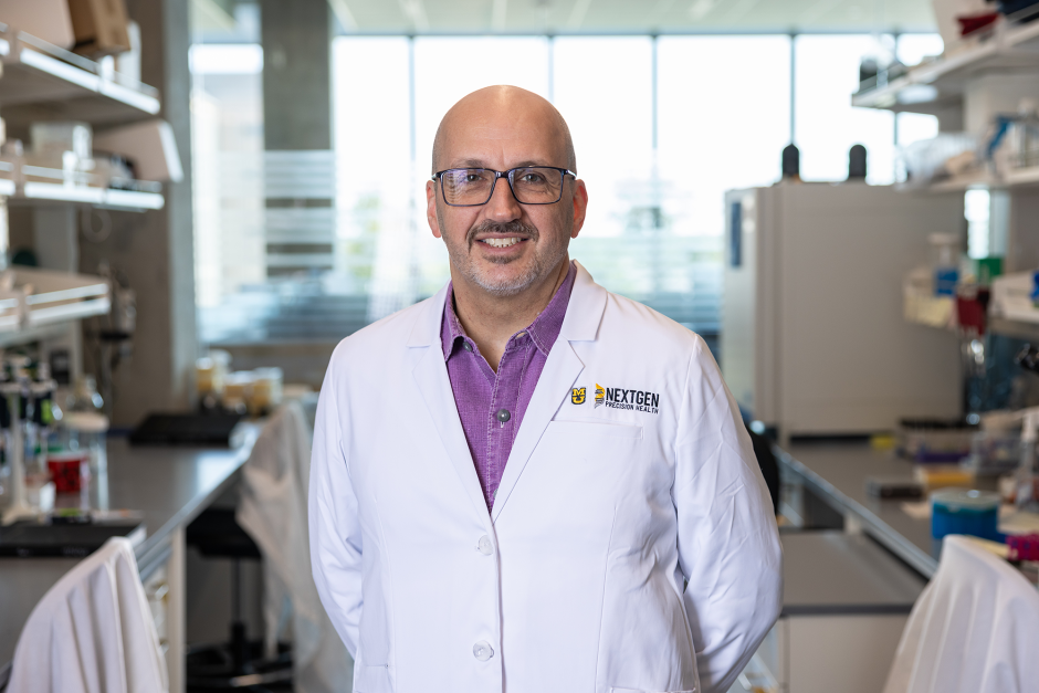 A researcher posing in the NextGen building.