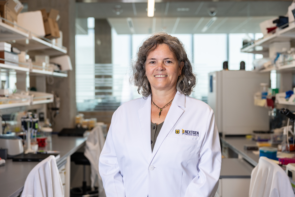 A researcher posing in the NextGen building.