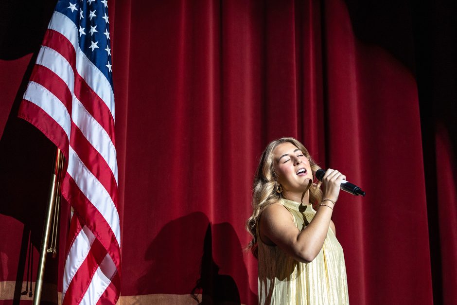 Student sings on stage