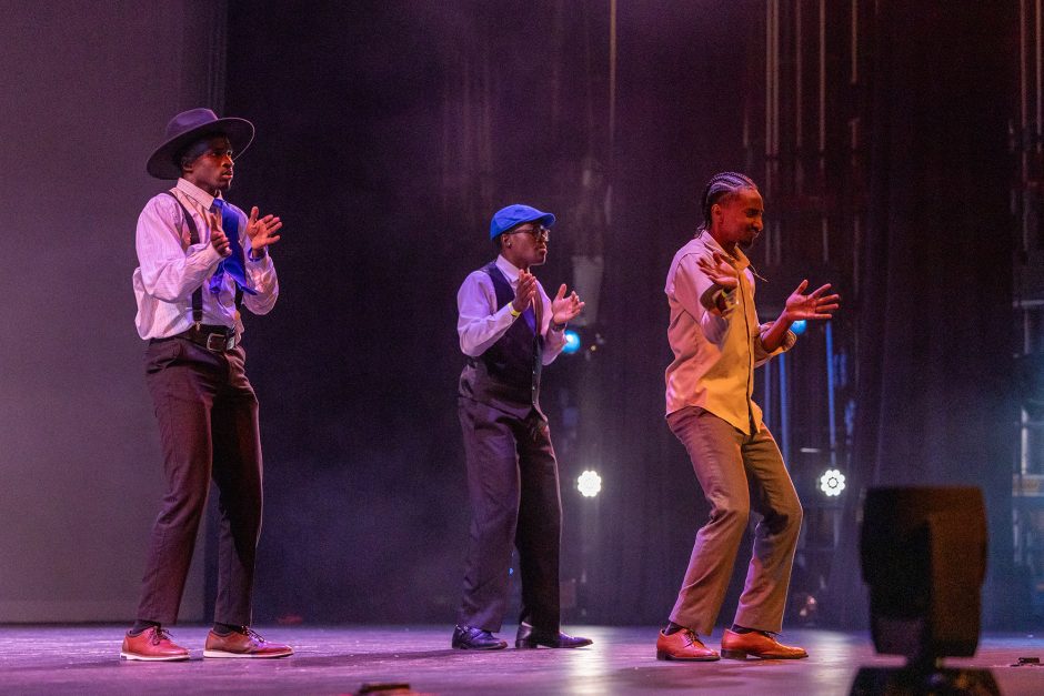 Students performing on stage