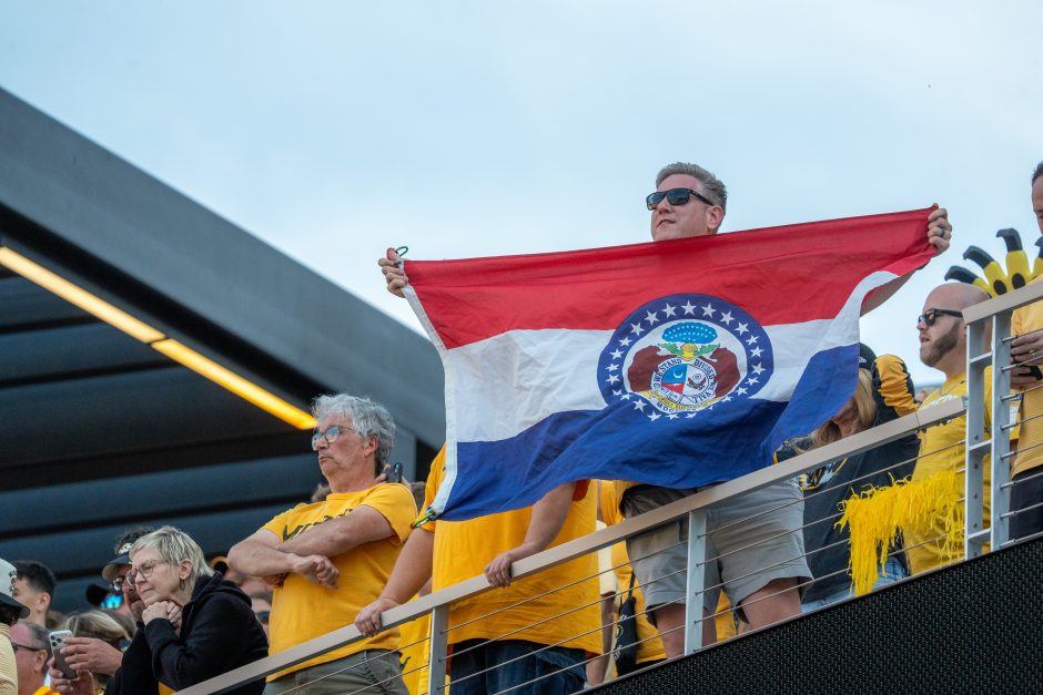 Man holds Missouri flag