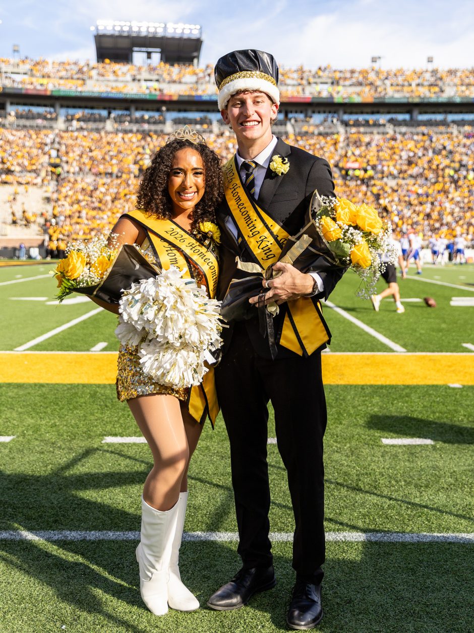 Homecoming King and Queen on football field
