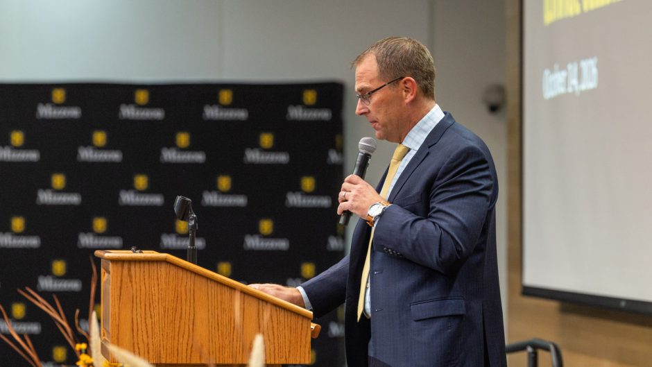 Man speaking at podium