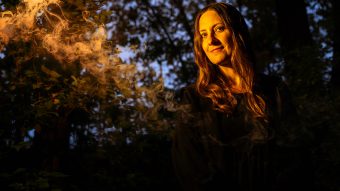 Woman in a dark spooky forest